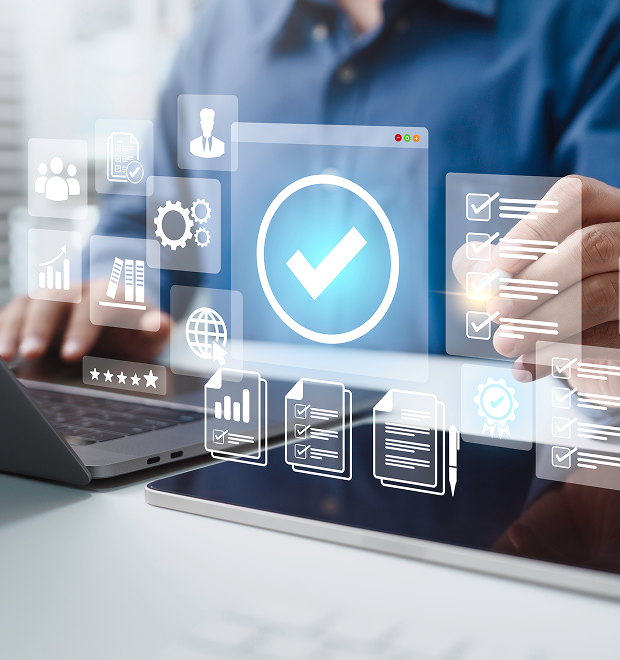 Person using a laptop with digital checkmark and document icons, representing online approval, verification, or workflow management processes.