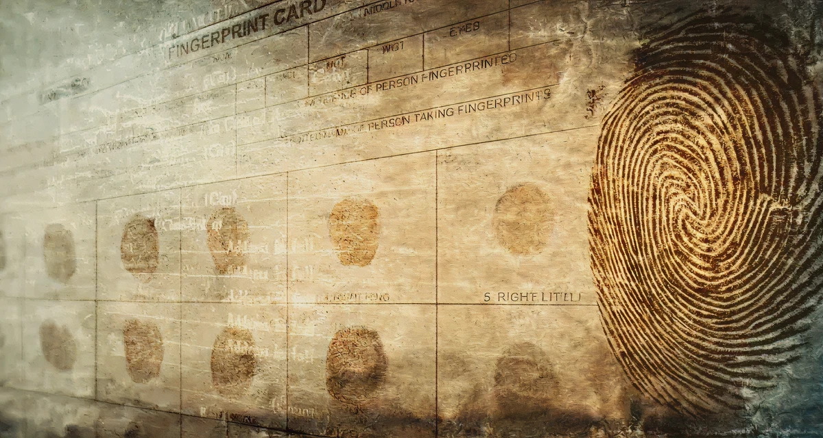 Close-up of fingerprint and card details