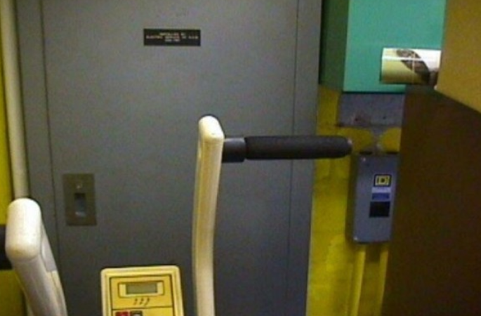 Exercise bike in a small, enclosed space.